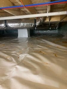 Crawlspace with white plastic layout